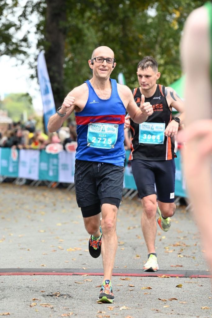 Alex finishing Chester Marathon 2022